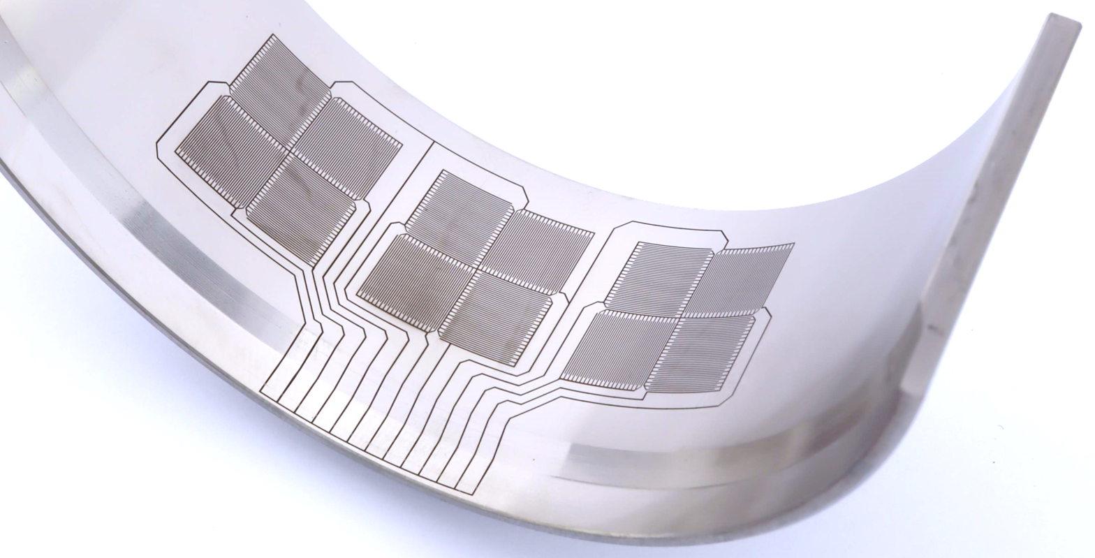 LZH offers companies a wide range of services, including optical coatings, additive manufacturing, and laser materials processing, such as the thin-film strain sensors shown here. (Photo: LZH)