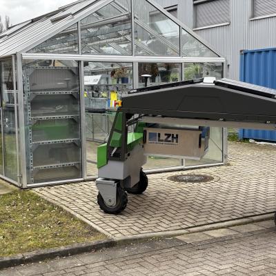 Feldrobotor or einem Gewächshaus.